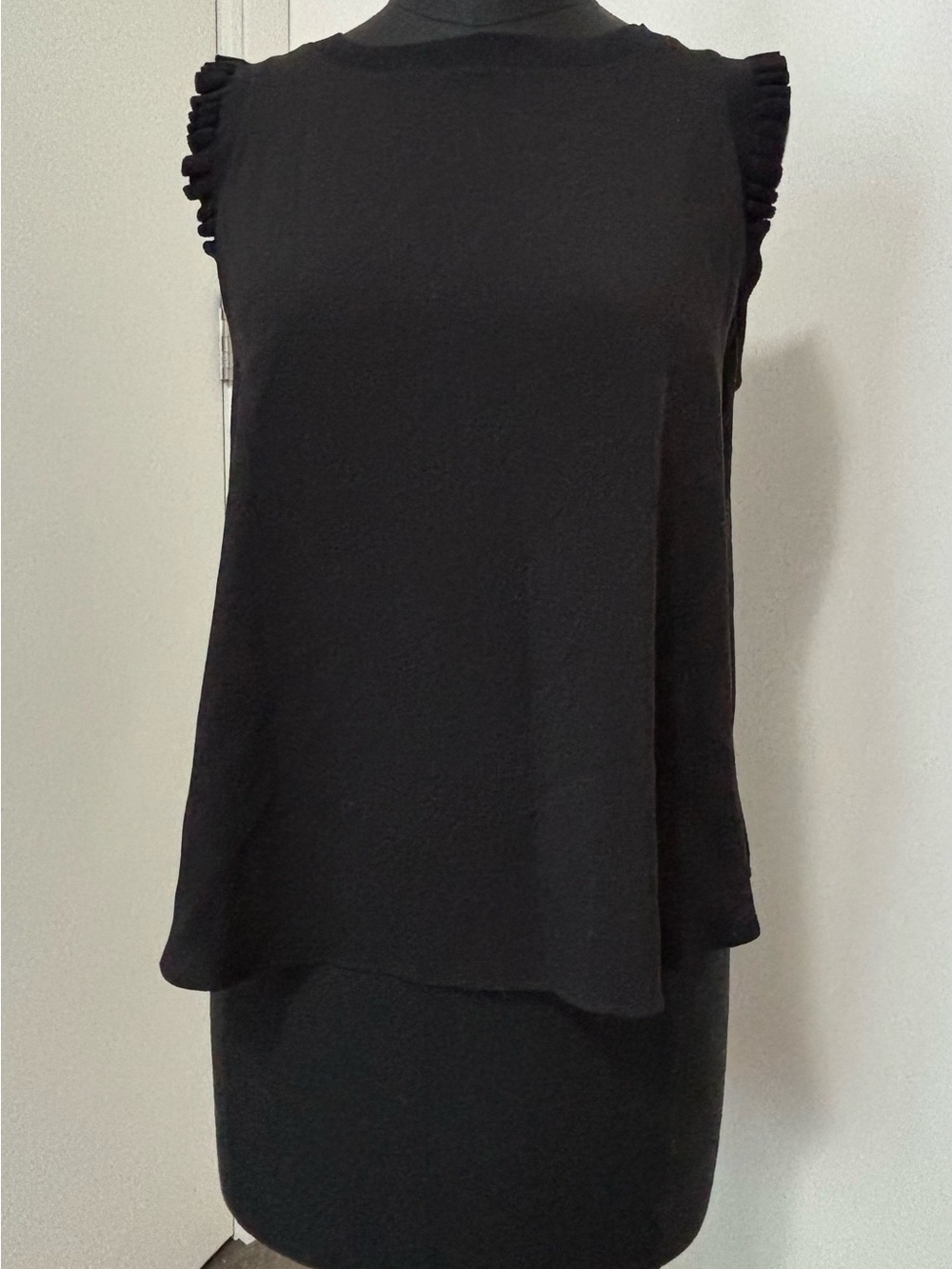 Black Sleeveless Ruffle-Trim Top